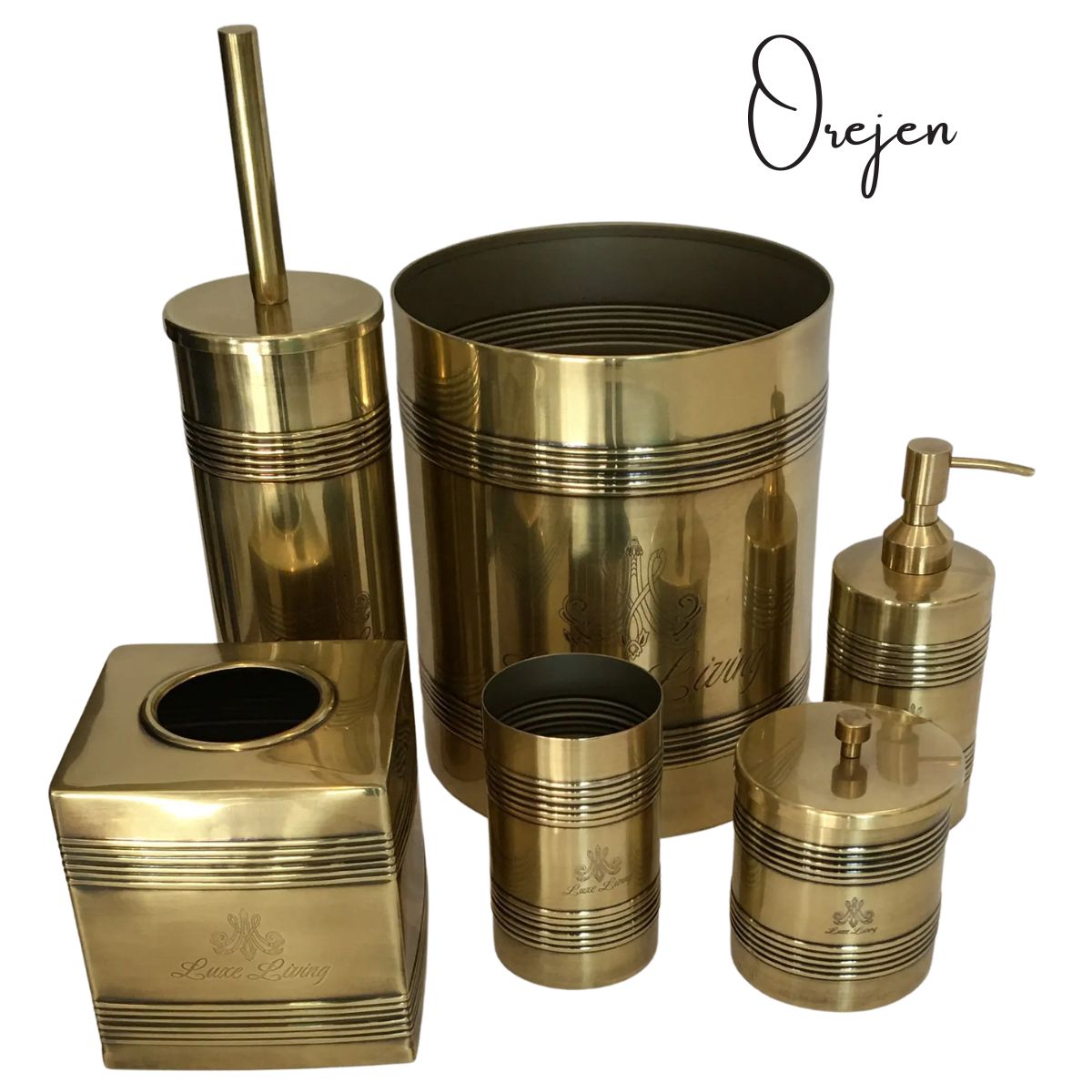 Set of Luxe matching bathroom accessories including a trash can, cup, and soap dispenser, cotton box , tissue box and toilet brush.