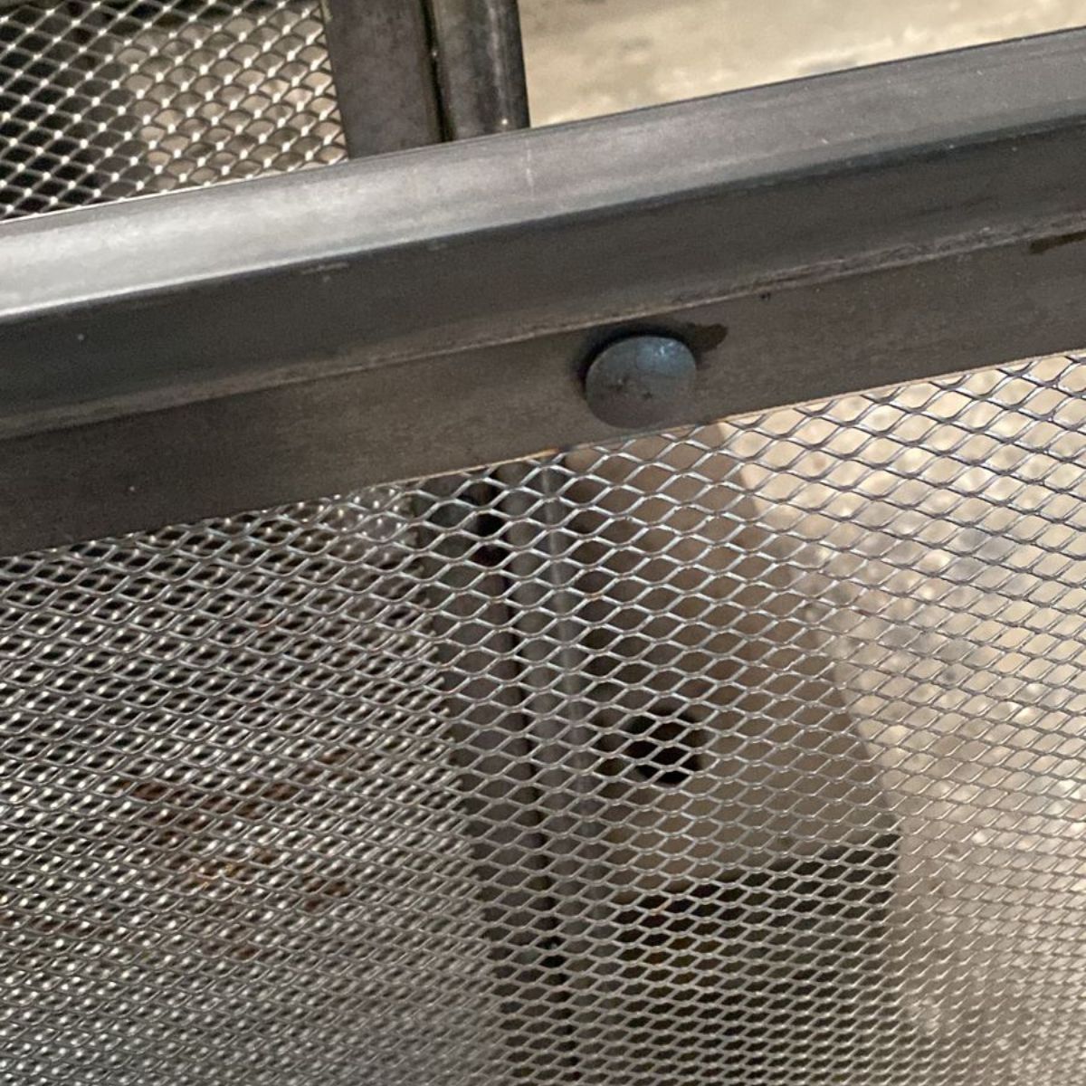 Stud detail to fire screen.
