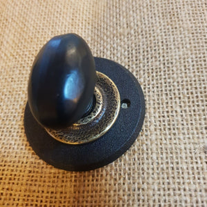 Black Oval large knob with Brass on Black.  Stunning !